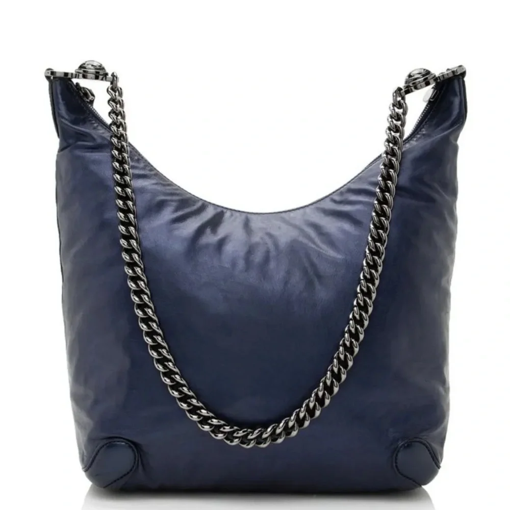 Gucci Metallic Leather Galaxy Chain Hobo
Size: 14.50" (L) x 5.00" (W) x 10 - Picture 1 of 16